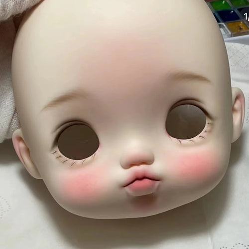 big eyes pouty doll