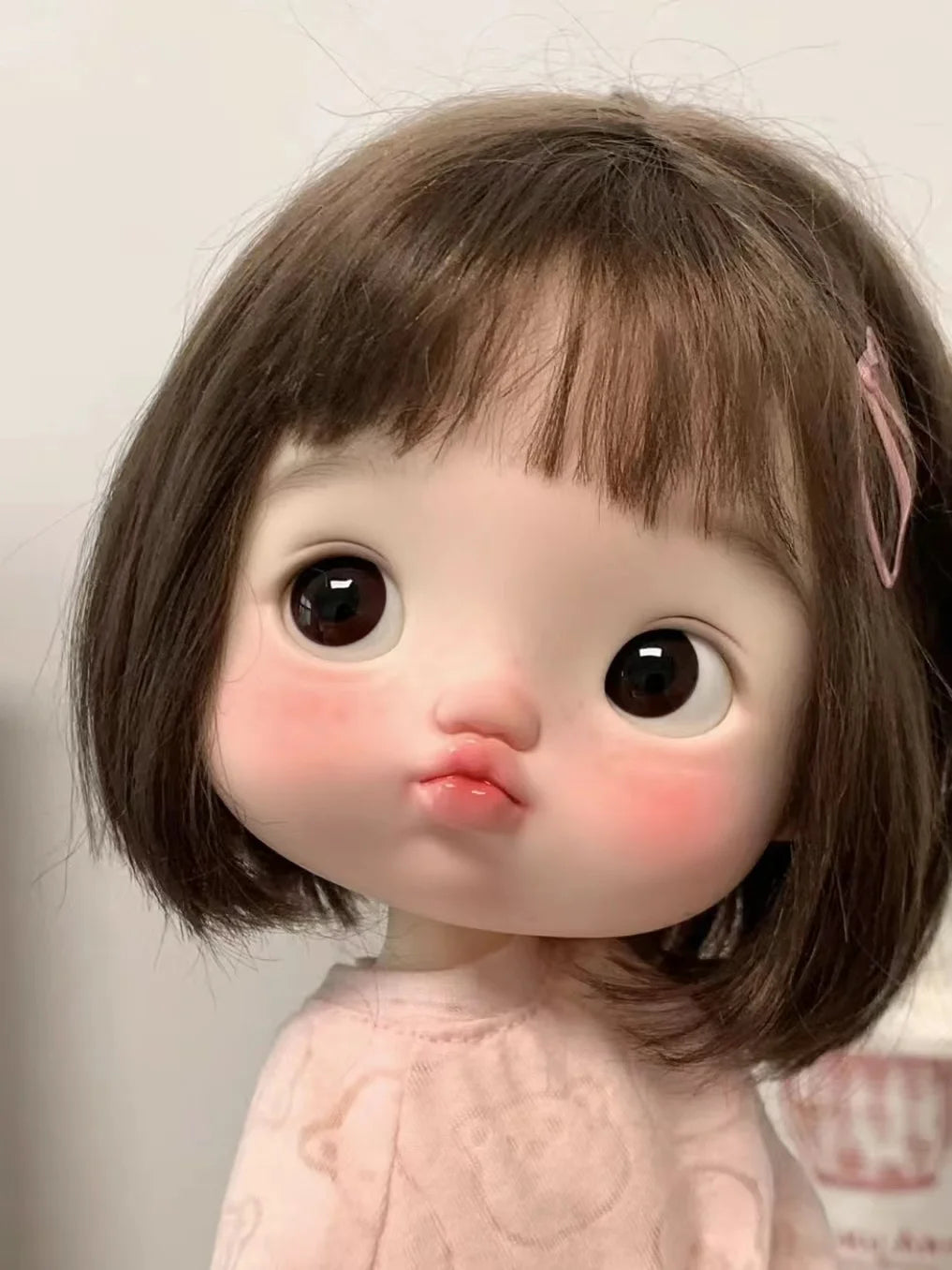 big eyes pouty doll